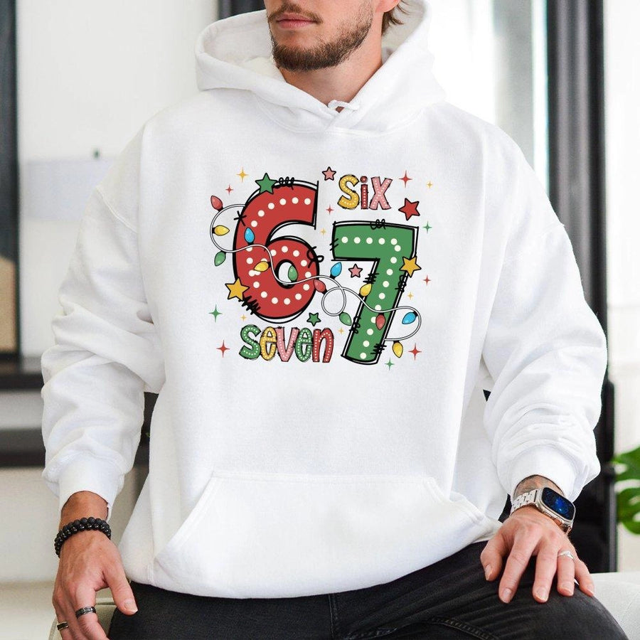 67 Christmas Hoodie | Festive Holiday Lights Graphic | Premium Cotton Blend | Funny Birthday or Holiday Gift for Ages 6-7