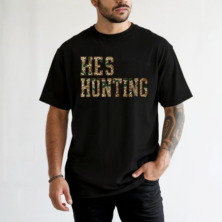 He's Hunting T-Shirt | Camo Print Varsity Lettering | 100% Cotton Premium Tee | Hunting Wife Gift for Deer Season