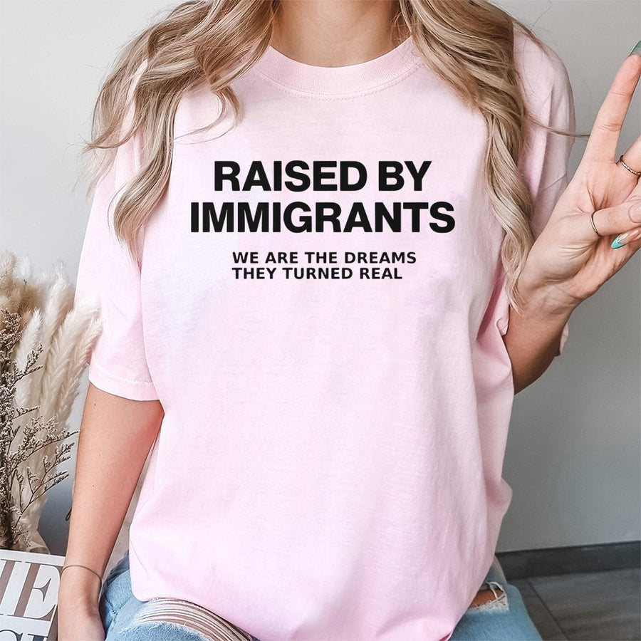 Raised By Immigrants T-Shirt | We Are The Dreams They Turned Real Graphic | Premium Soft Cotton Tee | Meaningful Gift For First Generation Americans