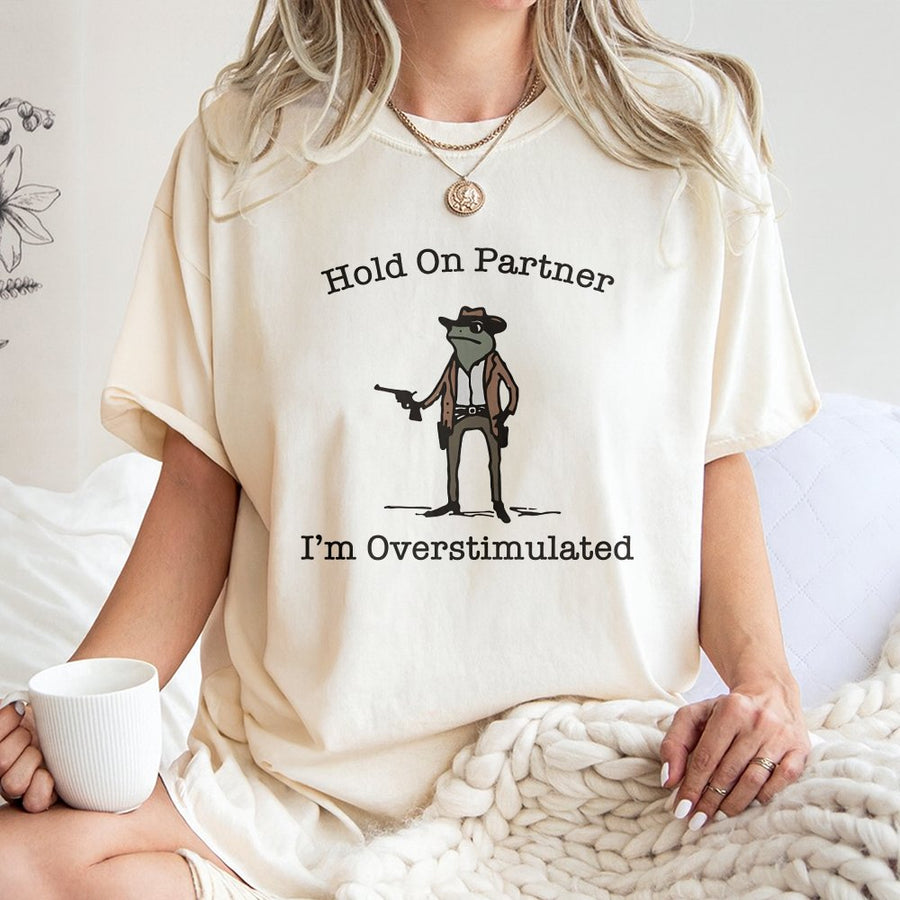 Cowboy Frog T-Shirt | Hold On Partner I'm Overstimulated Funny Meme Graphic | 100% Cotton Premium Tee | Unique Gift For Introverts And Neurodivergent Friends