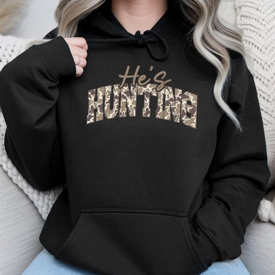 He's Hunting Camo Hoodie | Trendy Camouflage Text Graphic | Soft Cotton-Polyester Blend | Funny Gift for Women and Hunter Wives