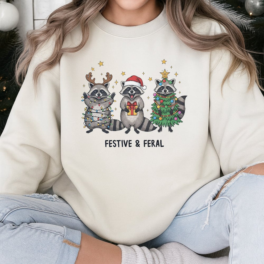 Festive & Feral Raccoon Sweatshirt | Funny Christmas Holiday Graphic Tee | Premium Cotton Blend | Gift for Animal Lovers & Trash Panda Fans