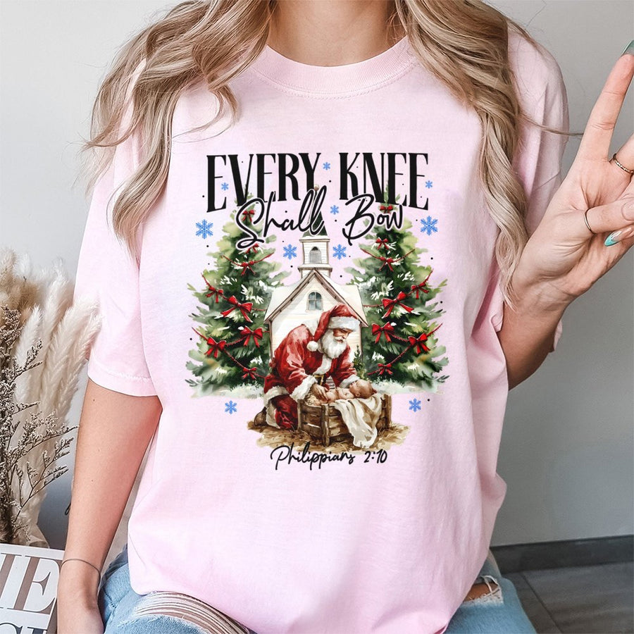 Every Knee Shall Bow T-Shirt | Santa Kneeling Before Baby Jesus | 100% Cotton Religious Christmas Graphic Tee | Meaningful Faith-Based Holiday Gift