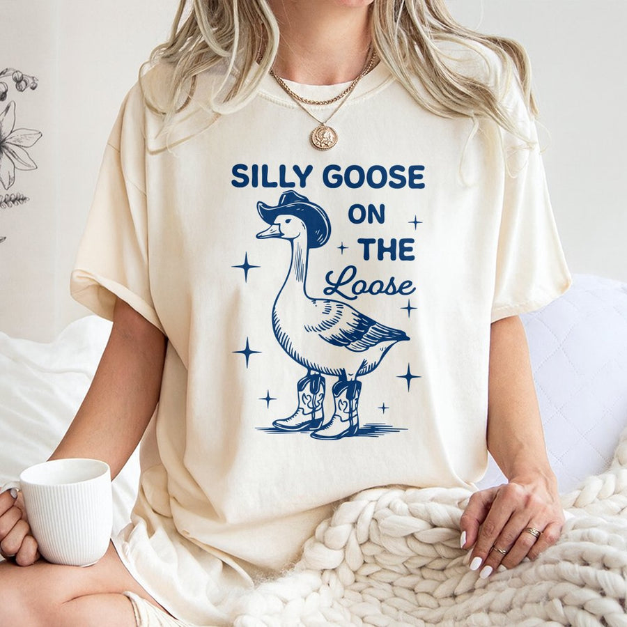 Silly Goose On The Loose T-Shirt | Cowboy Goose With Boots Design | Premium 100% Cotton Apparel | Funny Animal Humor Gift For Men And Women