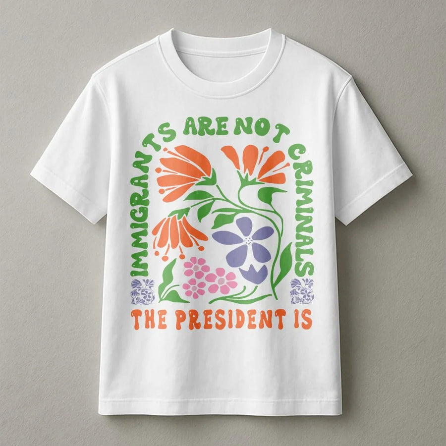 Immigrants Are Not Criminals T-Shirt | Floral Protest Graphic Design | 100% Cotton Premium Tee | Liberal Feminist Activist Gift