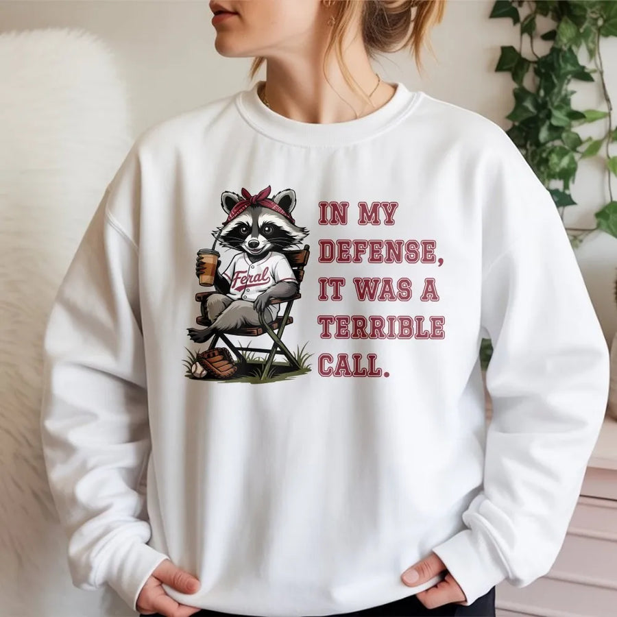 Funny Raccoon Baseball Sweatshirt | In My Defense It Was a Terrible Call | Premium Soft Cotton Tee | Humorous Sports Gift for Men and Women