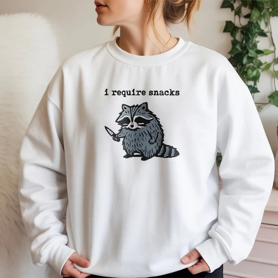 I Require Snacks Raccoon Sweatshirt | Funny Knife Raccoon Graphic | Premium Cotton Blend Crewneck | Cute Animal Lover Gift for Snack Lovers