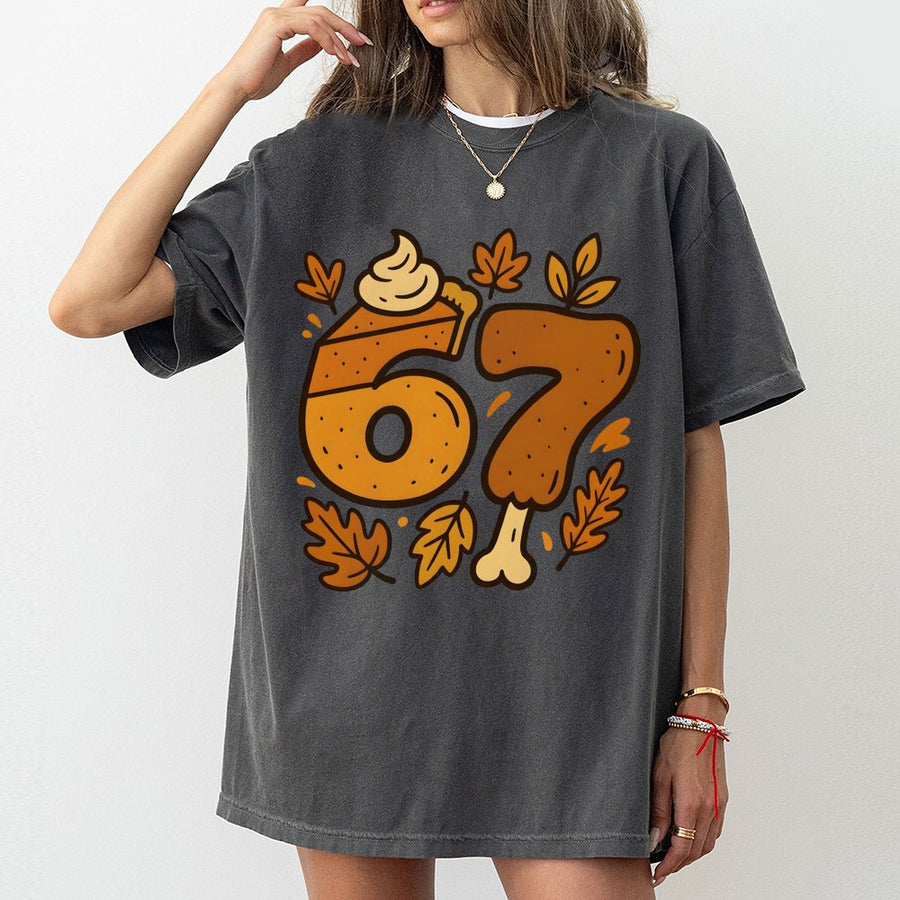 67 Birthday T-Shirt | Thanksgiving Pumpkin Pie and Turkey Graphic | Premium 100% Cotton Tee | Funny Fall Themed Birthday Gift for Him or Her