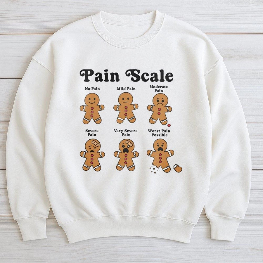 Gingerbread Pain Scale Sweatshirt | Funny Nurse Christmas Graphic | Soft Cotton Blend Unisex Pullover | Holiday Gift For Nurses And Nursing Students