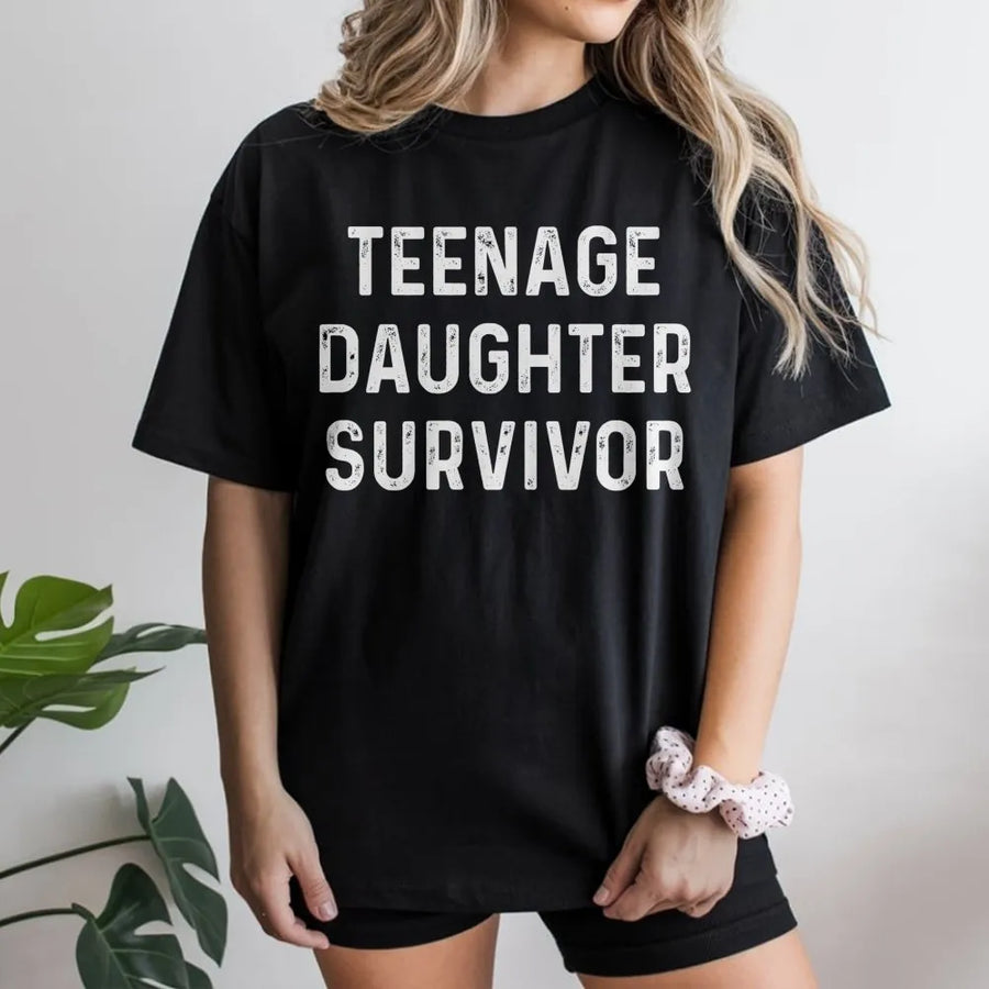 Teenage Daughter Survivor T-Shirt | Funny Sarcastic Quote Graphic | Premium Soft Cotton Tee | Perfect Father's Day 2026 Gift for Dad
