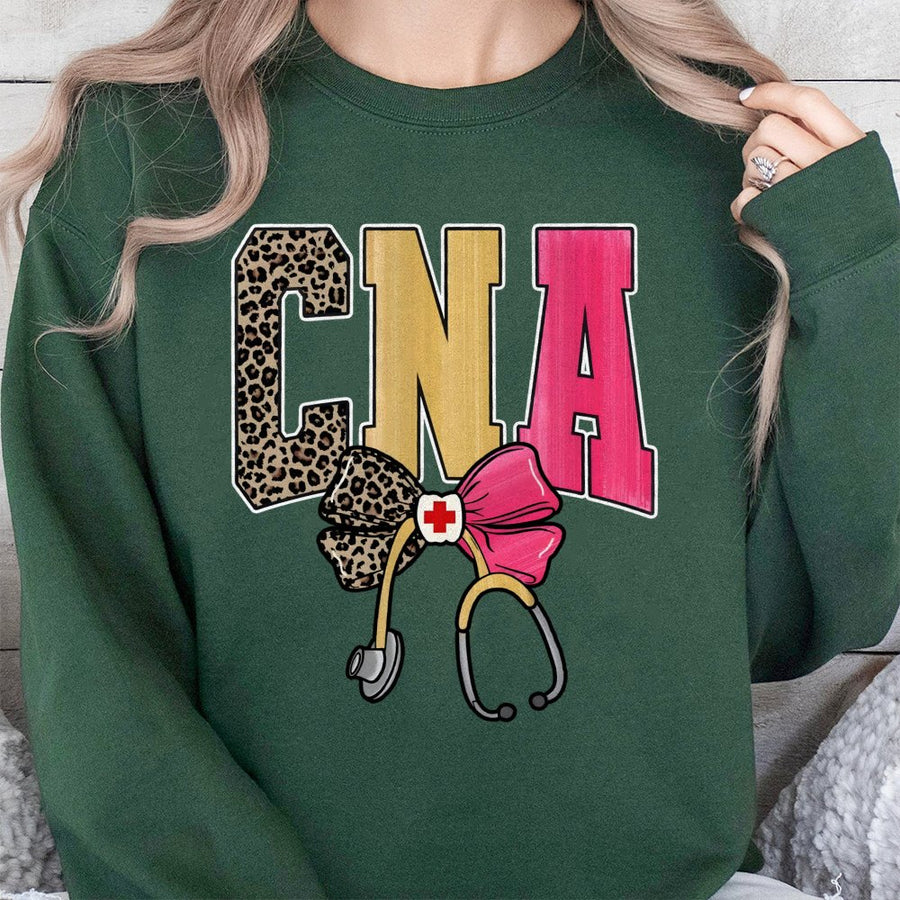 CNA Sweatshirt | Leopard Print Nursing Assistant Graphic with Bow and Stethoscope | Cotton Polyester Blend | Nursing School Gift for CNA Graduation