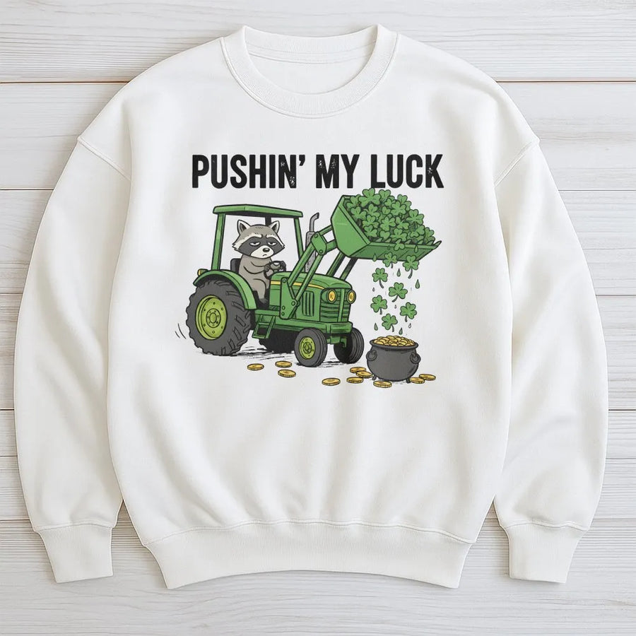 St Patrick's Day Raccoon Sweatshirt | Funny Tractor Graphic Design | Premium Cotton Blend | Gift for Farmers and Animal Lovers