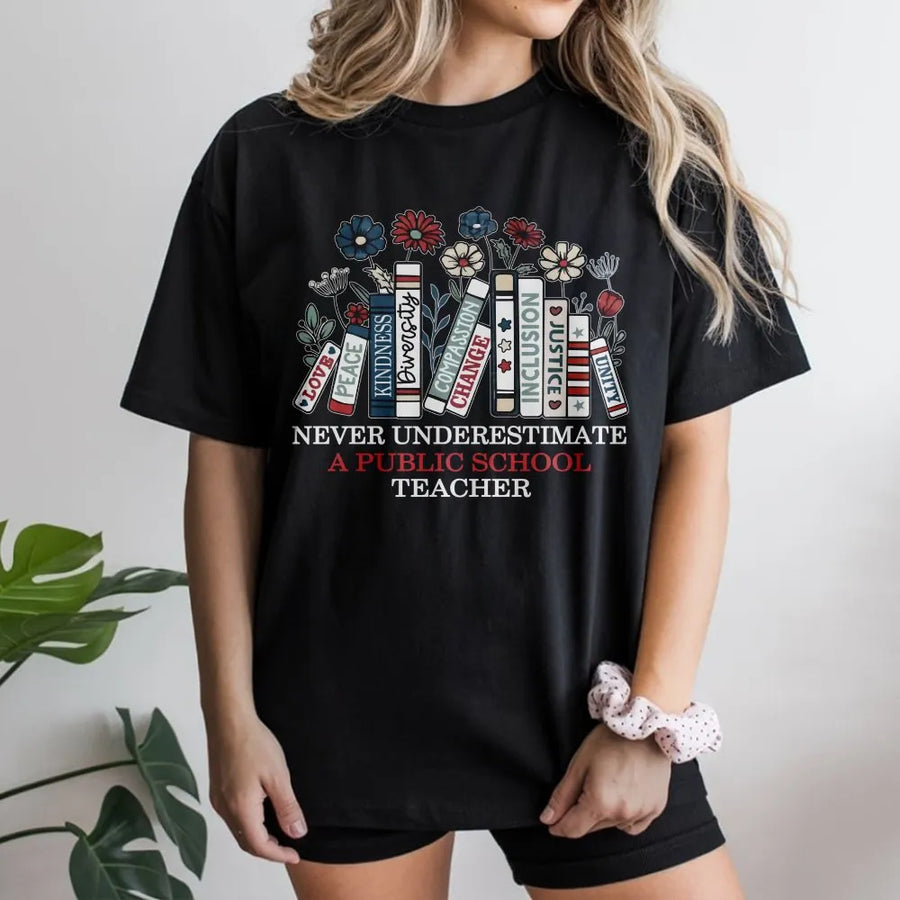 Never Underestimate A Public School Teacher T-Shirt | Floral Bookshelf Design | Soft 100% Cotton | Appreciation Gift for Educators & Teachers