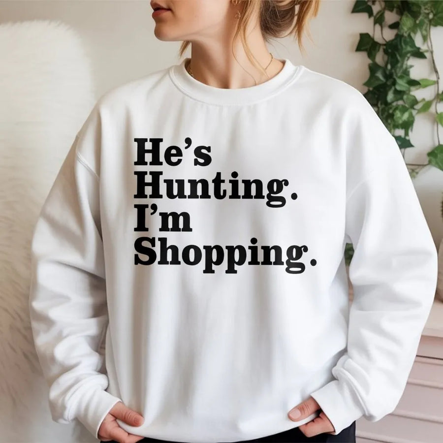 He's Hunting I'm Shopping Sweatshirt | Funny Country Wife Graphic | Soft Cotton Blend Premium Fleece | Cute Gift for Hunter Girlfriend