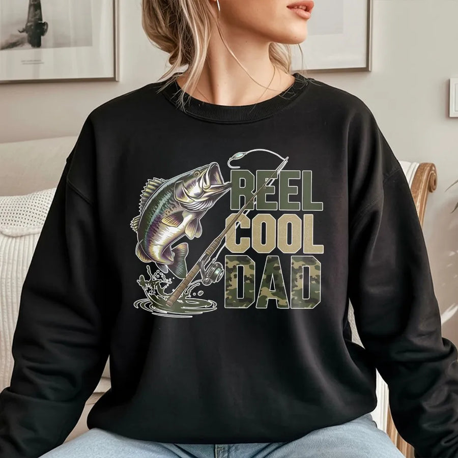 Reel Cool Dad Fishing Sweatshirt | Camo Bass Fisherman Graphic | Premium Cotton Blend | Funny Birthday or Father's Day 2026 Gift for Men