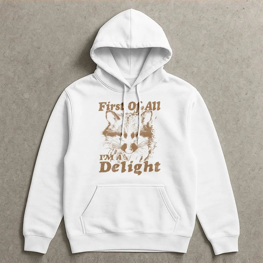 Funny Raccoon Hoodie | 'First Of All I'm A Delight' Graphic | Cozy Crewneck Pullover | Sarcastic Humor Gift for Raccoon Lovers
