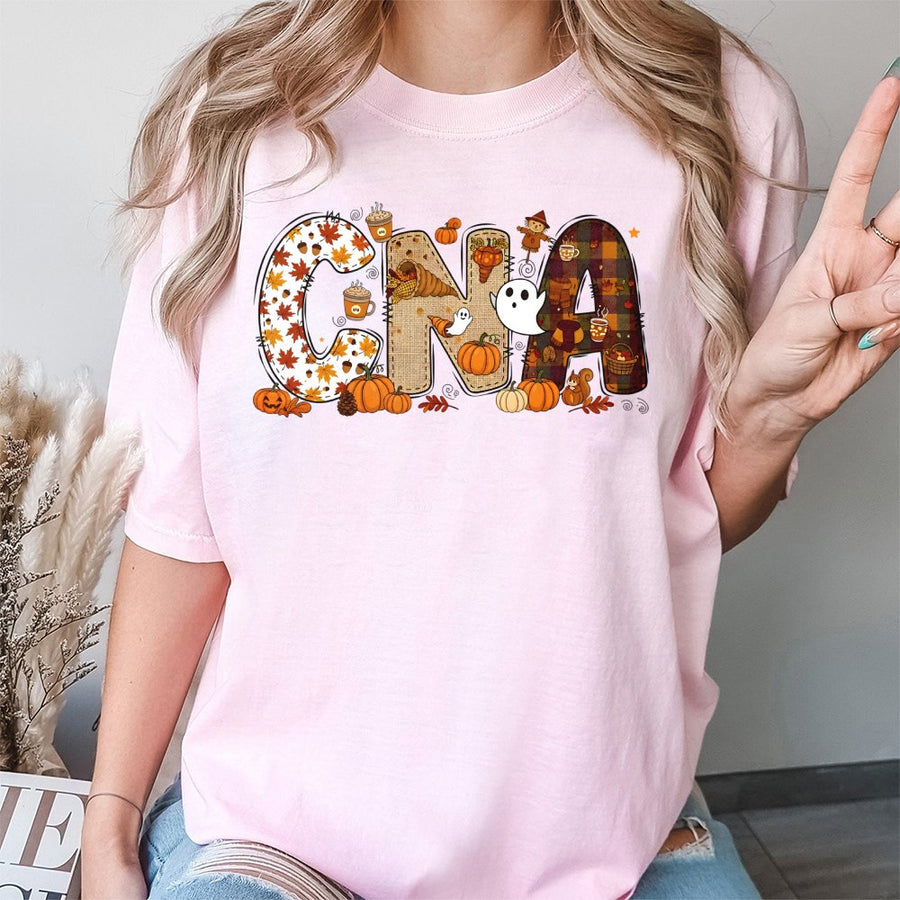 CNA Fall T-Shirt | Pumpkin Halloween Graphic Nursing Assistant Gift | 100% Cotton Premium Tee | Autumn Apparel for Medical Professionals