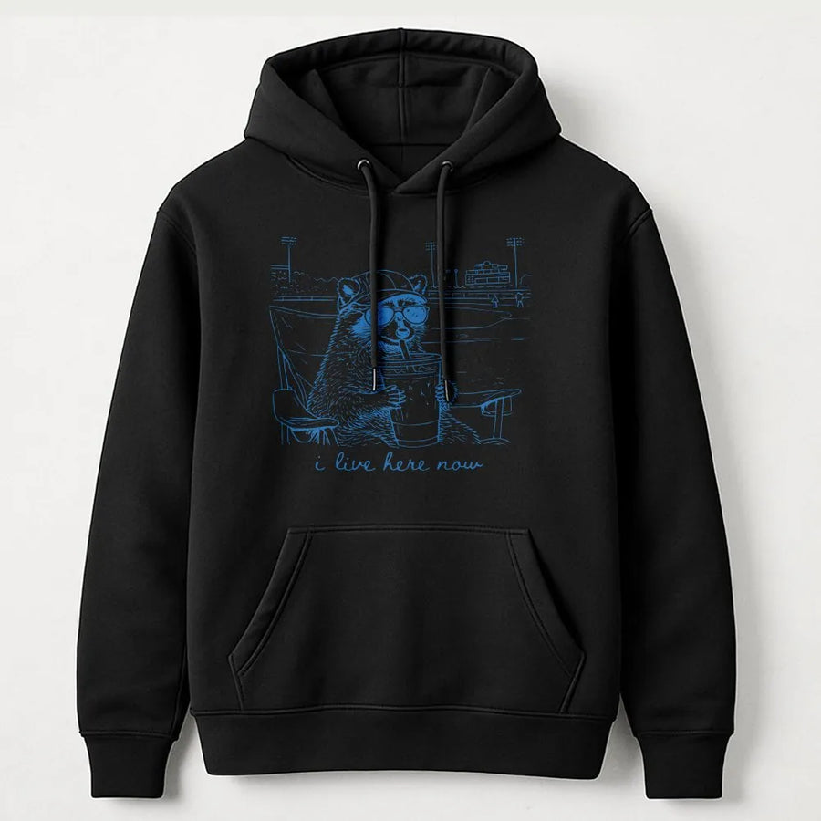 Funny Raccoon Baseball Hoodie | 'I Live Here Now' Graphic Sweatshirt | Premium Soft Blend | Humorous Gift for Sports Moms and Parents