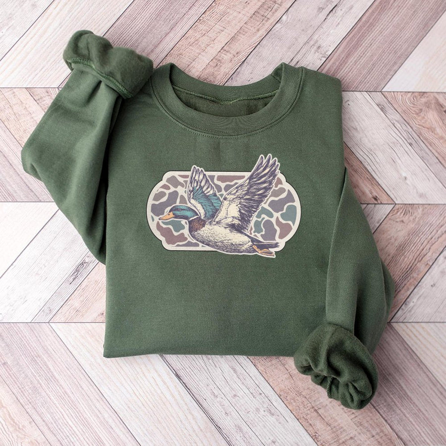 Flying Mallard Duck Sweatshirt | Retro Camo Bird Graphic Print | Premium Cotton Blend Crewneck | Outdoor Nature Gift for Hunters