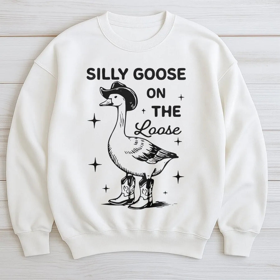 Silly Goose On The Loose Sweatshirt | Funny Cowboy Duck Graphic | Premium Cotton Blend Crewneck | Gift for Animal Lovers and Country Style Fans