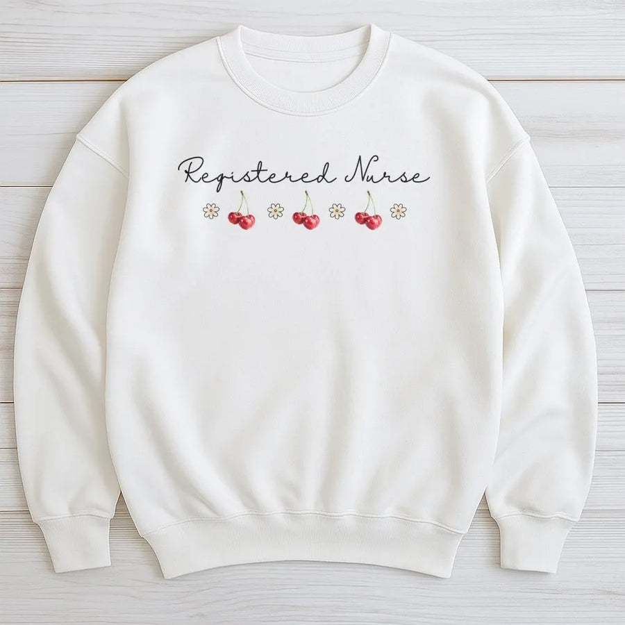 Registered Nurse Sweatshirt | Coquette Cherry Daisy Graphic | Premium Cotton Blend Crewneck | Nursing Graduation Gift For Her