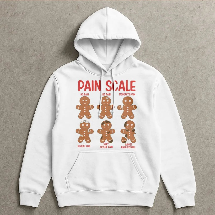 Pain Scale Gingerbread Man Hoodie | Funny Christmas Cookie Graphic | Premium Cotton Blend Unisex Sweatshirt | Unique Gift for Nurses and Doctors