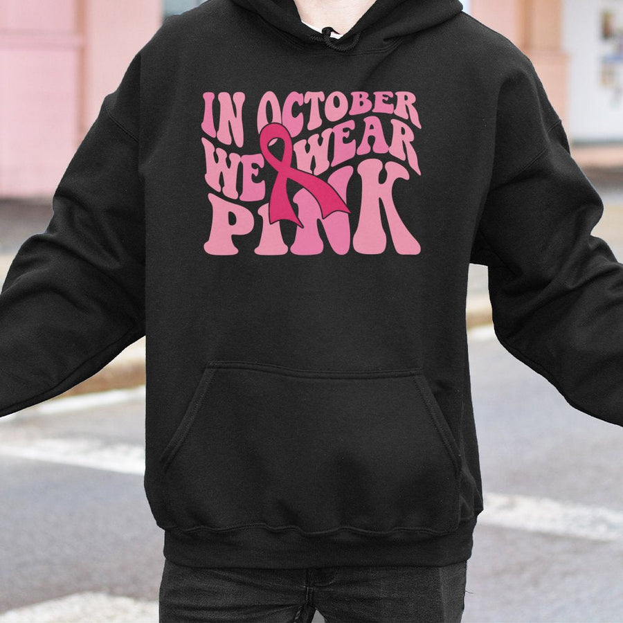 In October We Wear Pink Hoodie | Breast Cancer Awareness Ribbon Graphic | Soft Cotton-Poly Blend | Unisex Support Gift for Women and Survivors