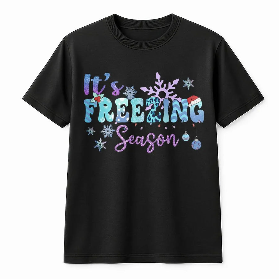 It's Freezing Season T-Shirt | Retro Groovy Snowflake Holiday Graphic | Premium Cotton Unisex Apparel | Cute Christmas Gift for Women & Family