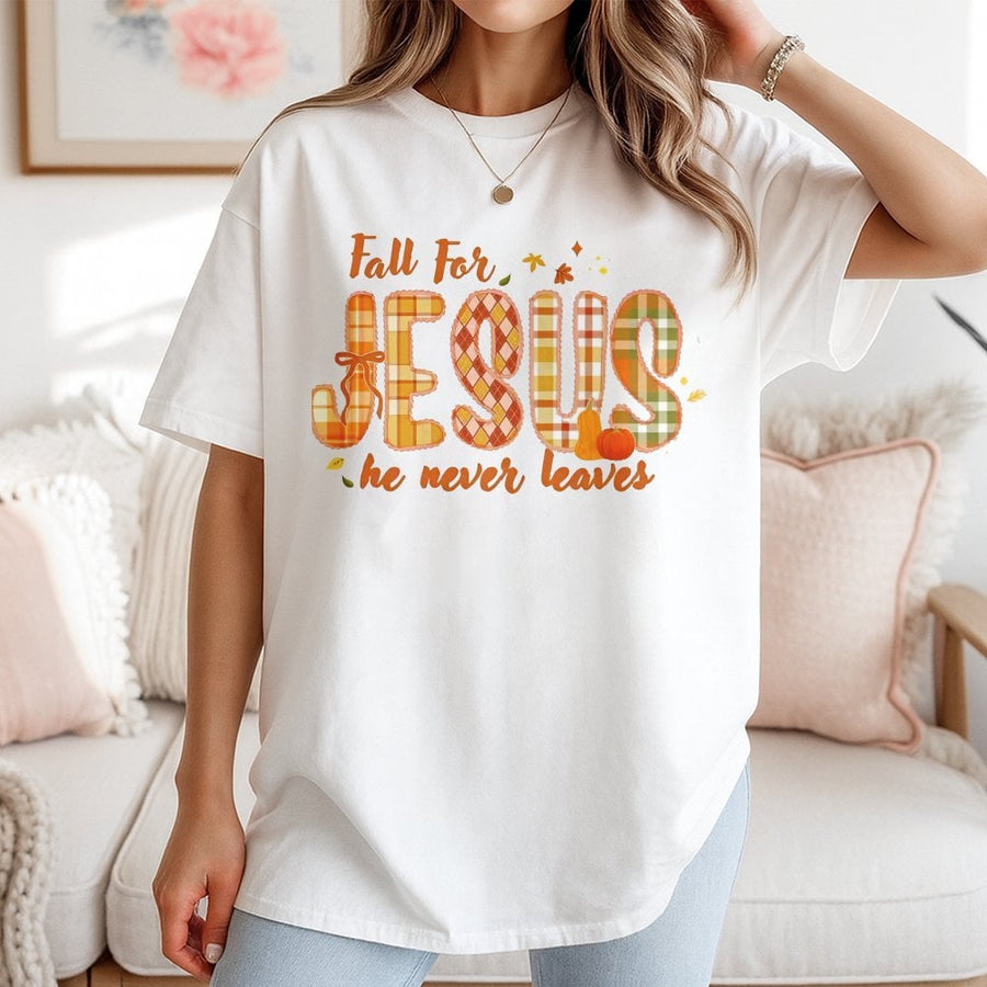 Fall For Jesus He Never Leaves T-Shirt | Plaid Pumpkin Christian Faith Design | 100% Cotton Premium Tee | Faith-Based Fall Gift for Women & Men
