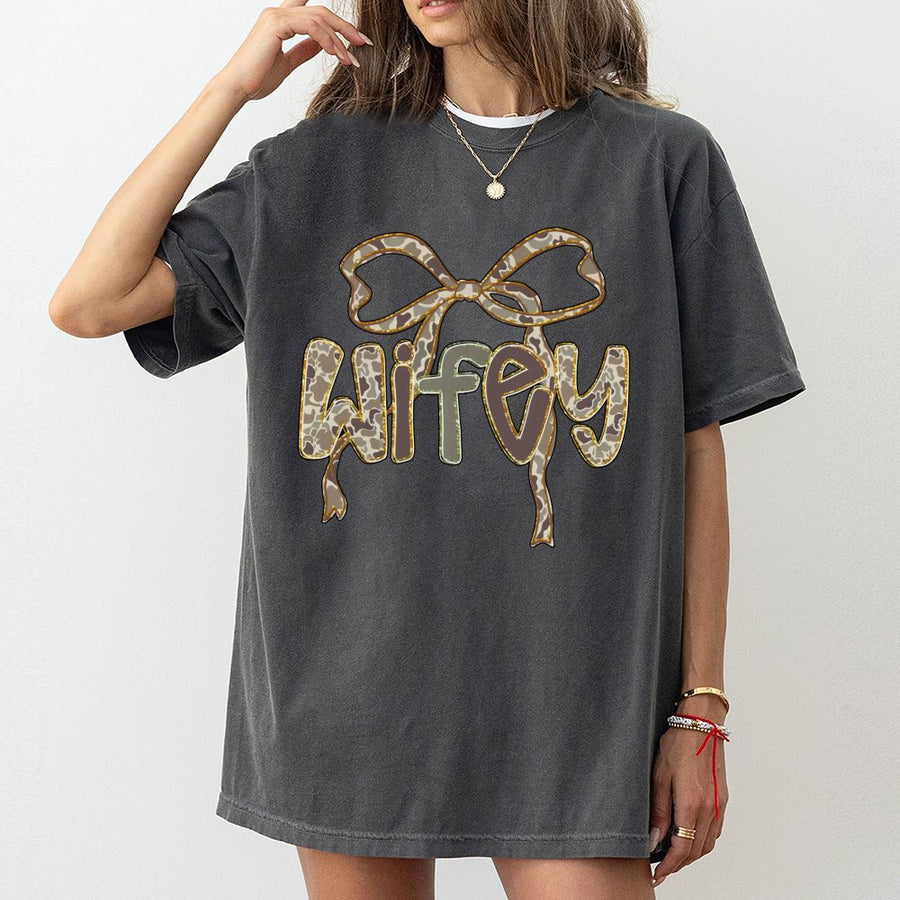 Wifey Camo Bow T-Shirt | Rustic Hunting Aesthetic Graphic Tee | 100% Cotton Premium Quality | Perfect Gift for Outdoorsy Women and Hunter Wives
