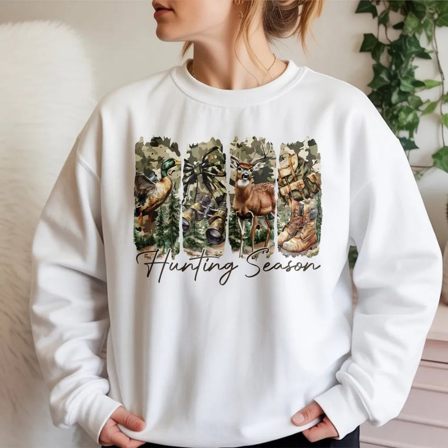 Hunting Season Sweatshirt | Deer And Duck Camo Coquette Bow Graphic | Premium Unisex Fall Apparel | Wildlife Outdoors Gift For Hunters