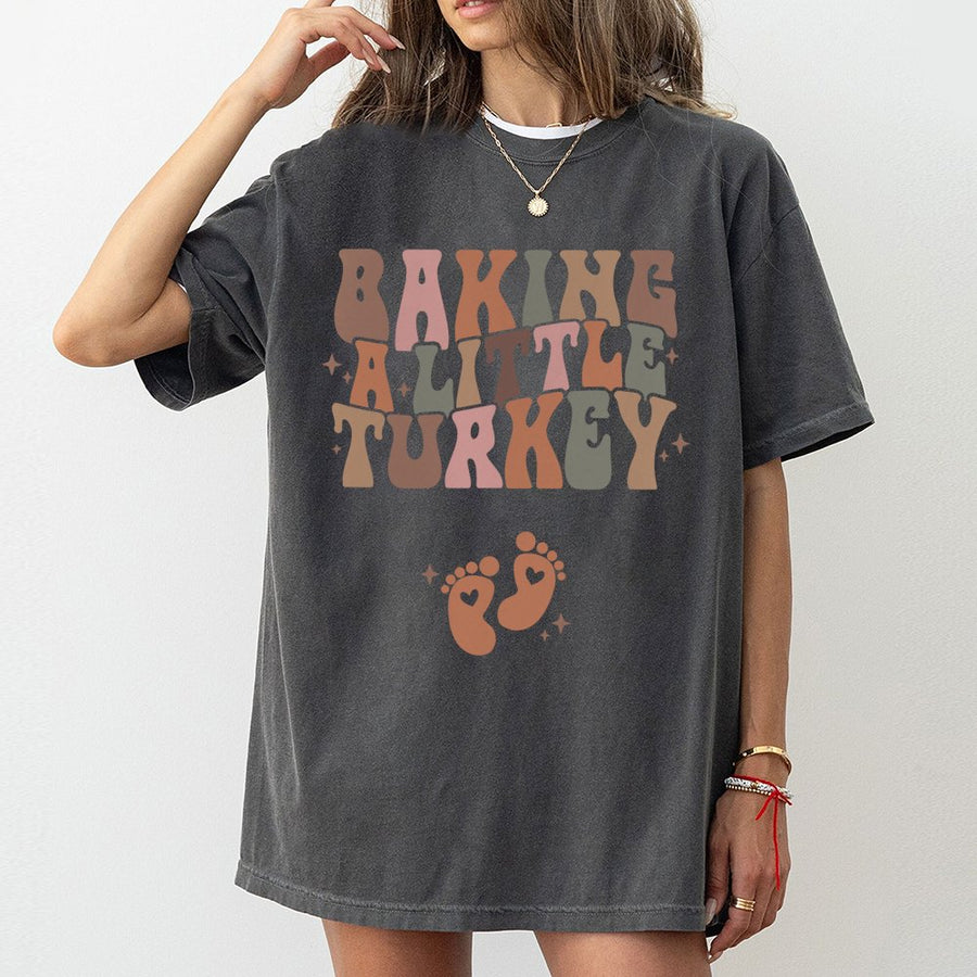 Baking A Little Turkey Maternity T-Shirt | Retro Fall Pregnancy Announcement | 100% Cotton Premium Tee | Cute Thanksgiving Baby Reveal Gift