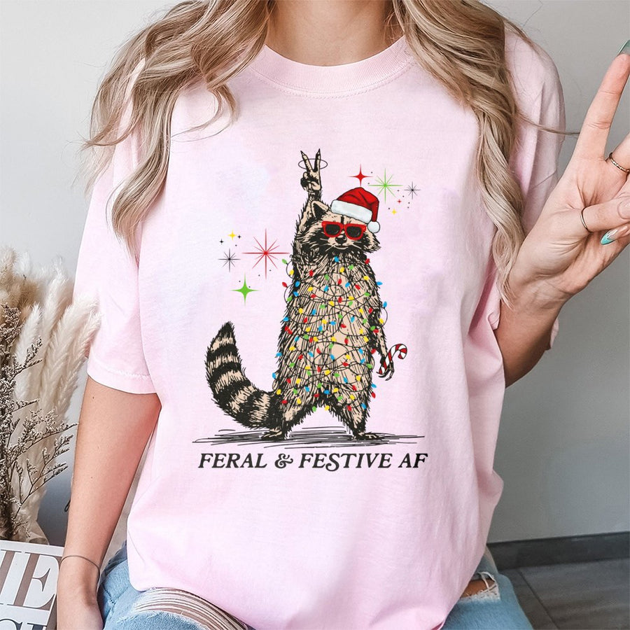 Feral and Festive AF Raccoon T-Shirt | Funny Tangled Christmas Lights Graphic | Premium Cotton Unisex Tee | Unique Ugly Christmas Party Gift