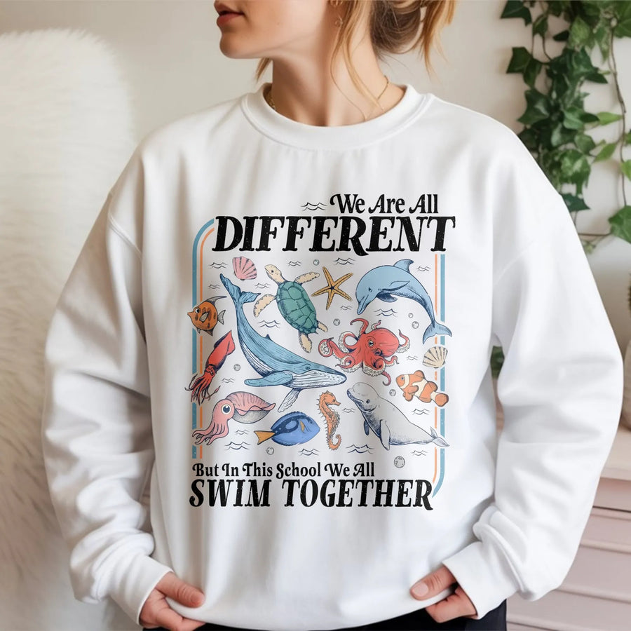 We Are All Different Swim Together Sweatshirt | Inclusive Ocean Life Graphic Tee | Soft Cotton Blend Unisex Pullover | Teacher Gift Back to School