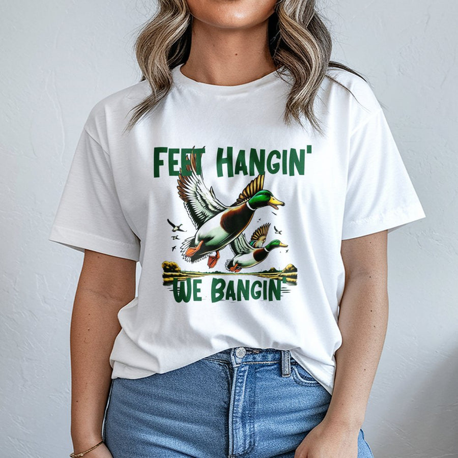 Duck Hunting T-Shirt | Feet Hangin' We Bangin' Mallard Graphic | Premium 100% Cotton Tee | Funny Gift for Hunters & Outdoor Enthusiasts