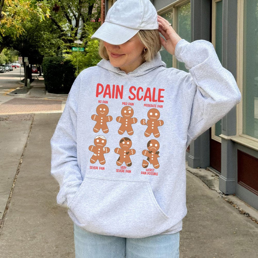 Pain Scale Gingerbread Hoodie | Funny Christmas Nurse Sweatshirt | Premium Cotton Blend | Holiday Gift for Healthcare Professionals