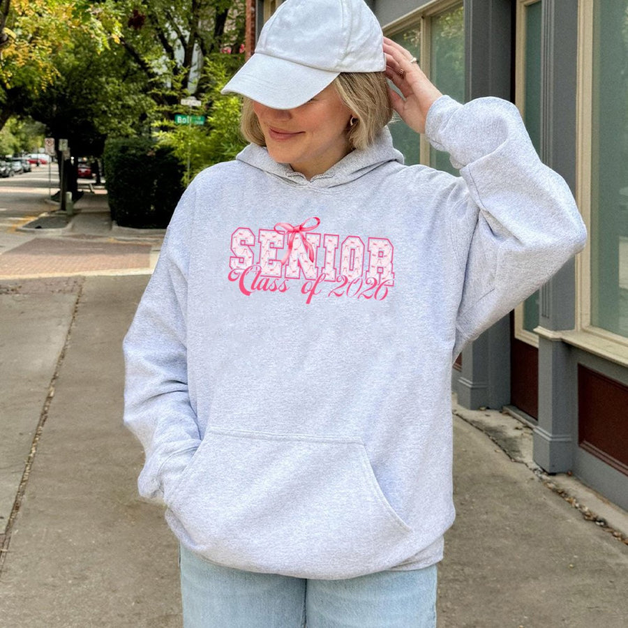 Senior Class Of 2026 Hoodie | Cute Pink Bow Varsity Graphic | Premium Cotton Blend Pullover | Graduation Gift For High School College Students