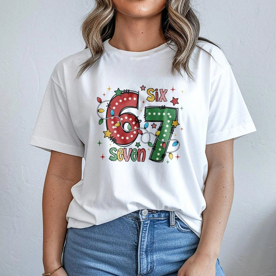 67 Birthday Christmas T-Shirt | Holiday Lights Festive Number Graphic | Premium Soft Cotton Tee | Funny Xmas Party Gift for Kids and Adults