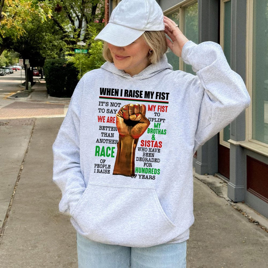 Raised Fist Protest Hoodie | Black History Month Awareness Graphic | Cotton-Poly Blend Premium Apparel | Empowering Gift For Activists