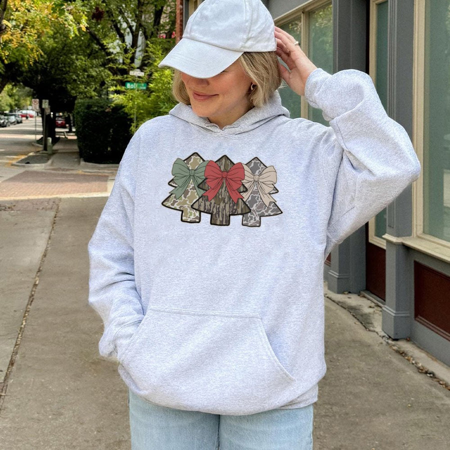 Camo Christmas Tree Hoodie | Coquette Bow Holiday Graphic | Soft Cotton-Polyester Blend | Trendy Hunter Gift for Women & Men