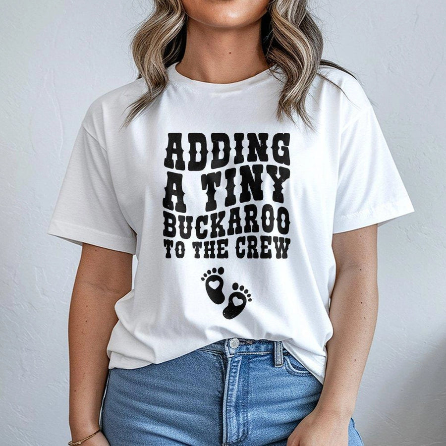Adding A Tiny Buckaroo To The Crew T-Shirt | Western Pregnancy Announcement | Premium Soft Cotton Tee | Cute Cowgirl Baby Reveal Gift For Mom