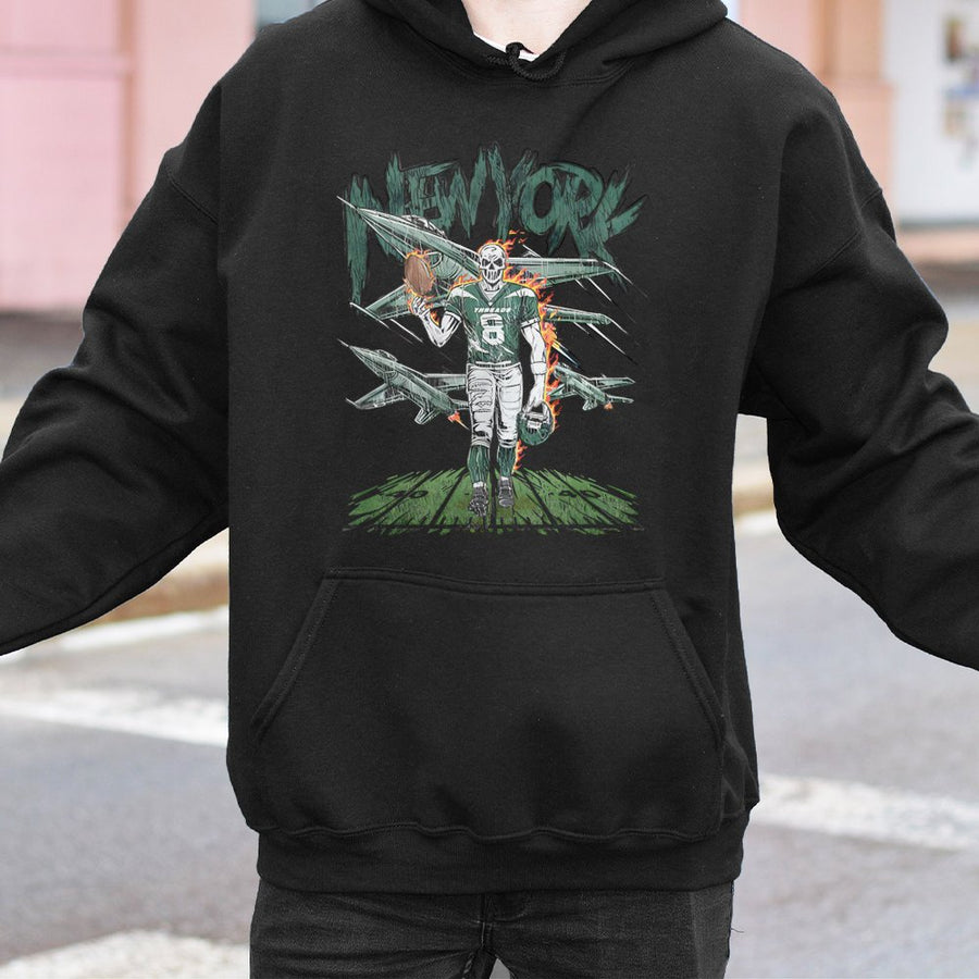 New York With A Skeleton Football Player Wearing Jersey Number 8, Holding A Football And Helmet, With Fighter Jets In The Background Hoodie