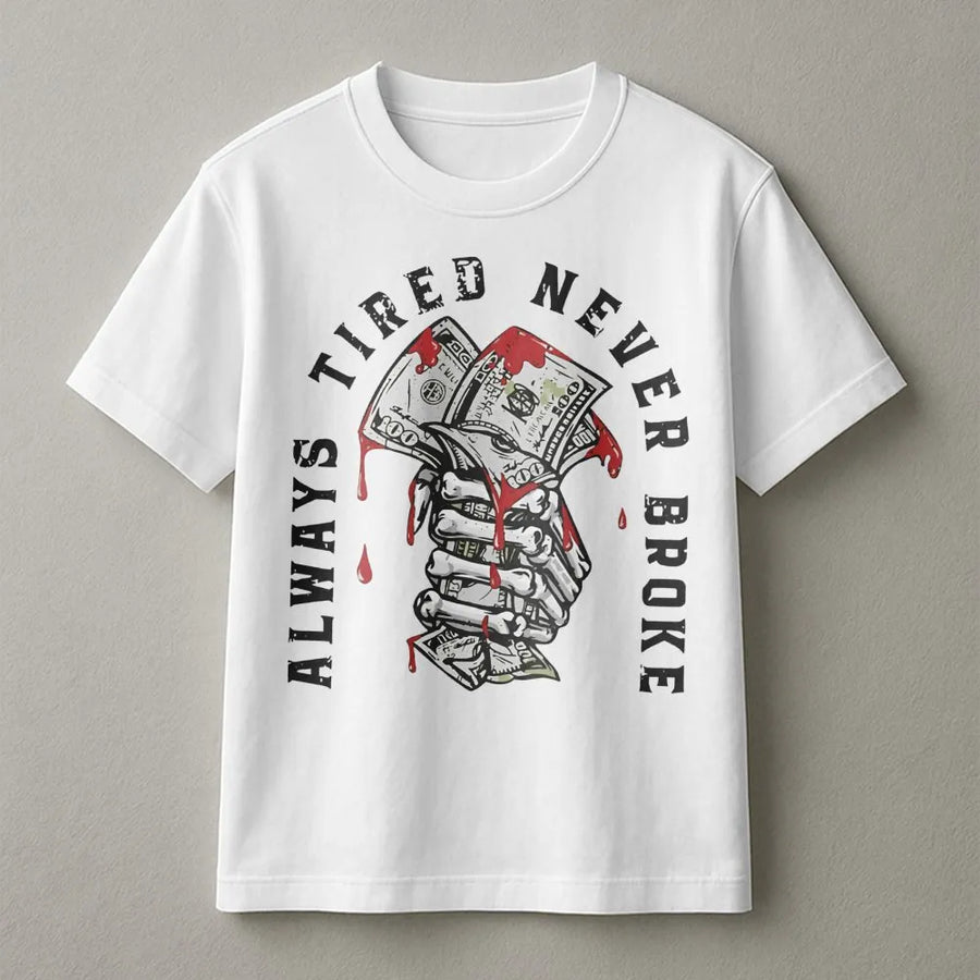 Always Tired Never Broke T-Shirt | Skeleton Hand Holding Money Graphic | Premium Cotton Unisex Tee | Hustle Culture Motivation Gift