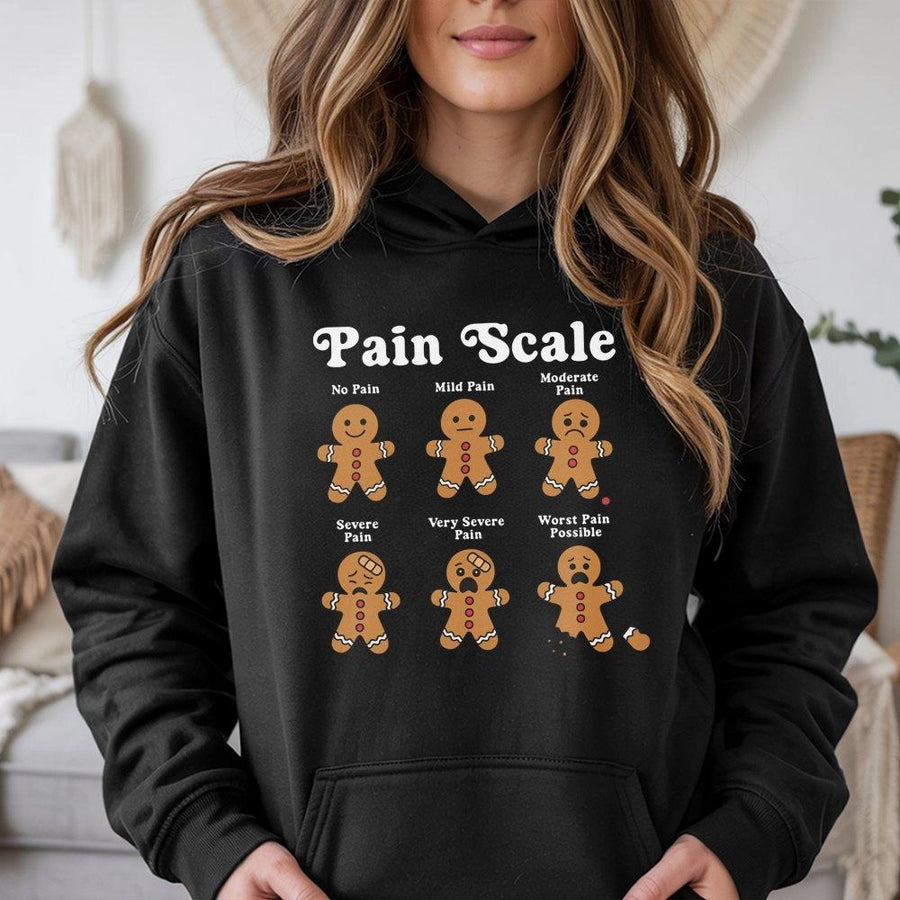 Funny Gingerbread Pain Scale Hoodie | Cute Nurse Christmas Graphic Sweatshirt | Premium Cotton-Poly Blend | Holiday Gift For Nurses & Medical Staff
