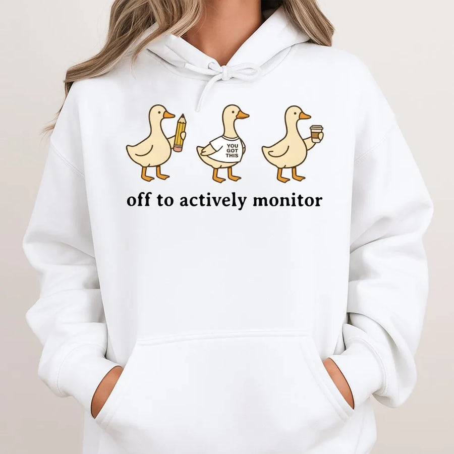 Actively Monitor Duck Hoodie | Funny Cartoon Ducks Slogan | Premium Cotton-Blend Sweatshirt | Sarcastic Office Humor Gift for Teacher or Nurse