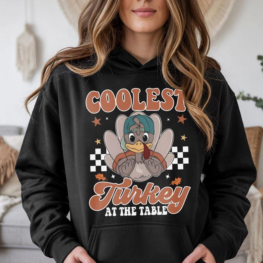 Coolest Turkey At The Table Hoodie | Retro Thanksgiving Cartoon Graphic | Premium Cotton-Poly Blend | Funny Fall Holiday Gift For Family
