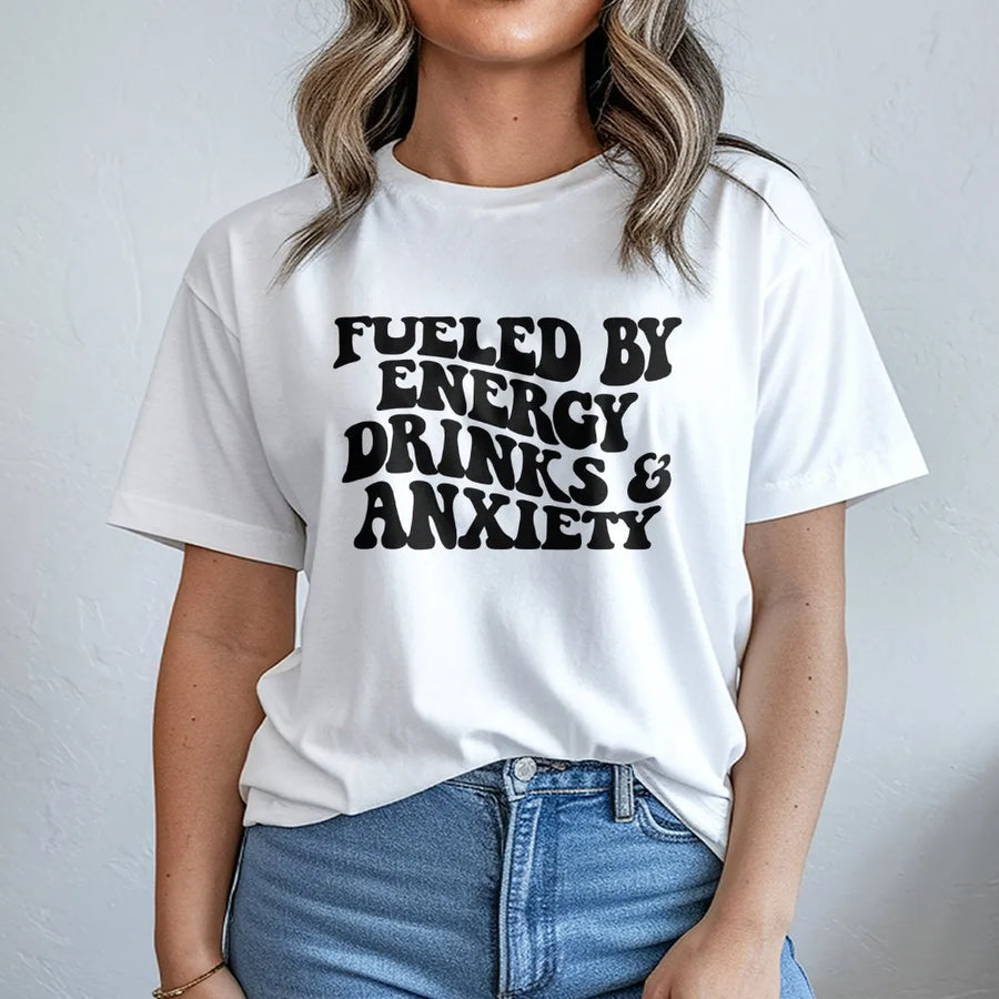 Fueled By Energy Drinks And Anxiety T-Shirt | Retro Groovy Typography | 100% Soft Cotton | Funny Relatable Gift For Students And Coworkers