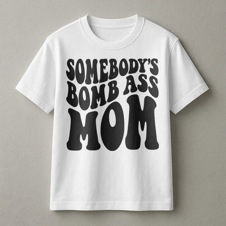 Somebody's Bomb Ass Mom T-Shirt | Retro Wavy Typography Graphic Tee | Premium 100% Cotton | Funny Mother's Day 2026 Gift for New Mom