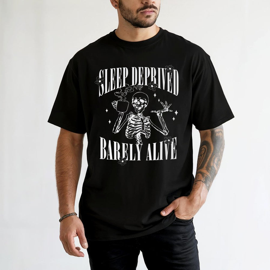 Sleep Deprived Barely Alive T-Shirt | Skeleton Drinking Coffee Graphic | 100% Premium Cotton | Funny Caffeine Lover Gift for Men and Women