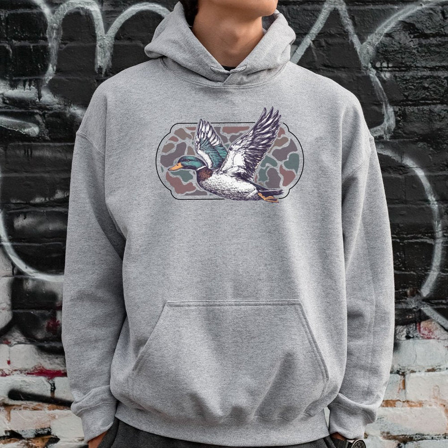 Flying Mallard Duck Hoodie | Retro Camo Wildlife Graphic | Premium Cotton Blend | Gift for Hunters and Nature Lovers